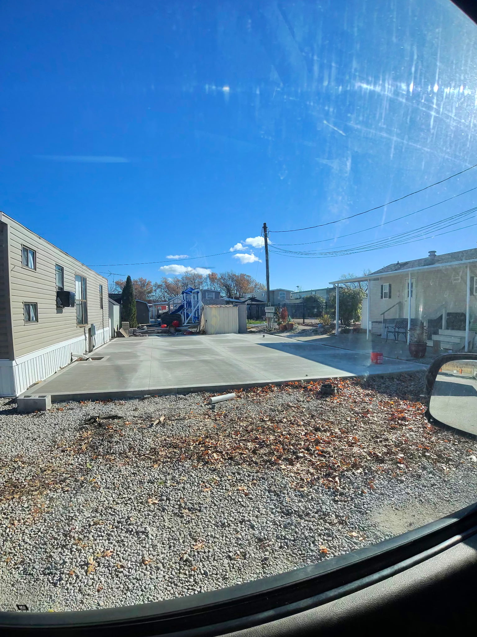 Wide jobsite view of residential concrete flatwork.